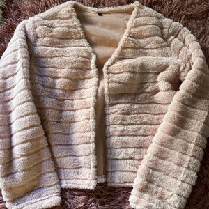 Pink crop faux fur jacket